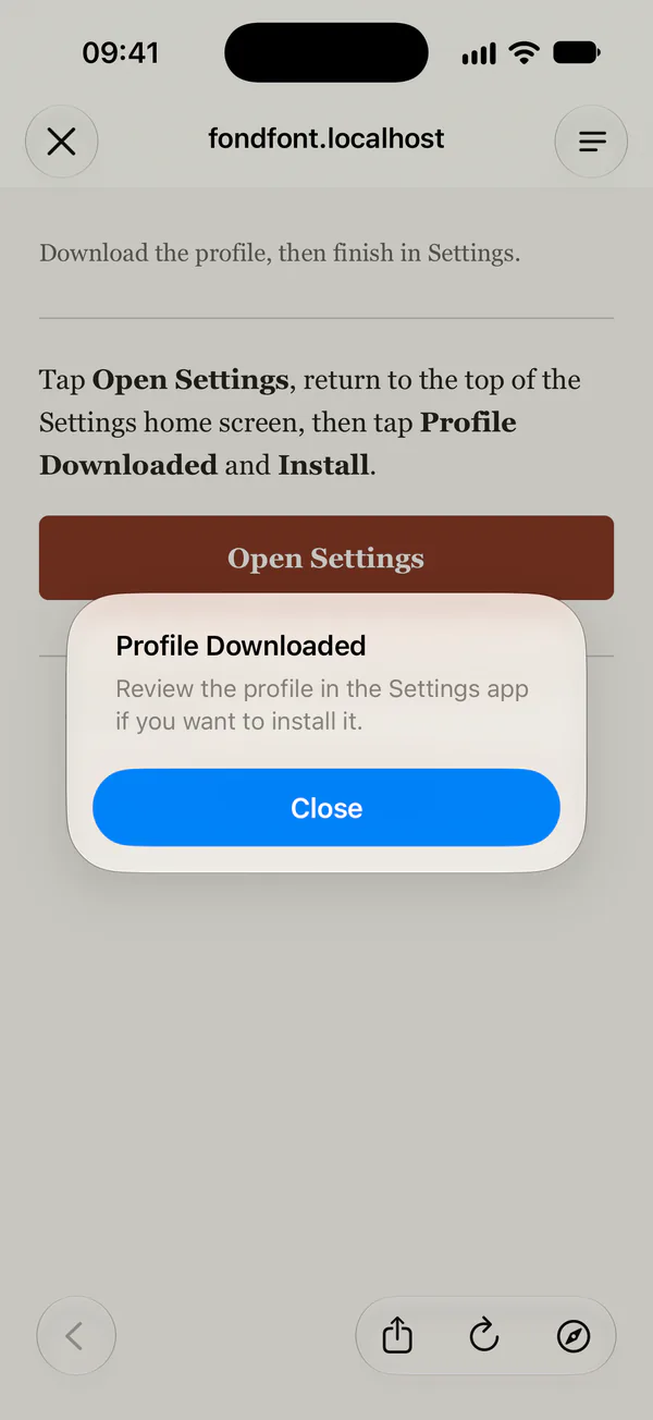 The system confirms the download. Open Settings is on the page behind the message.